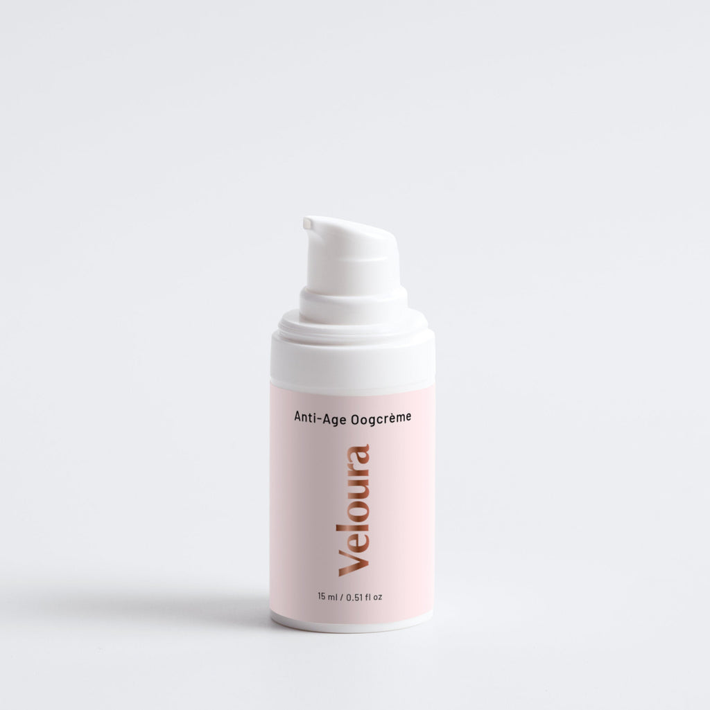 Fles met Veloura Anti-Aging Collection Box oogcrème in een zachtroze pompflacon, geschikt voor natuurlijke huidverzorging en skincare gericht op anti-aging.