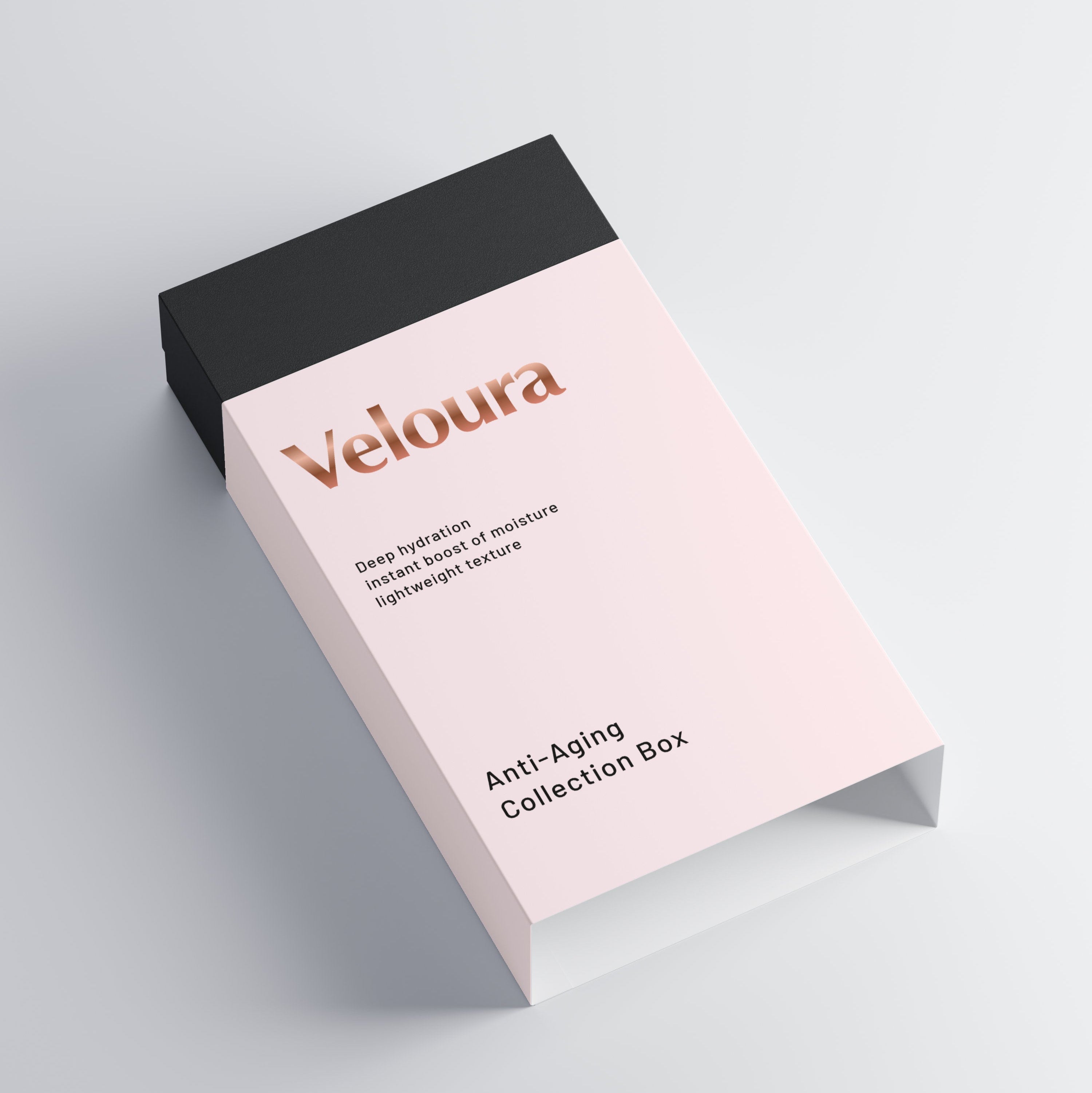 Elegante zwarte en roze verpakking van de Anti-Aging Collection Box van Veloura, gericht op natuurlijke huidverzorging met focus op hydratie en lichte textuur.